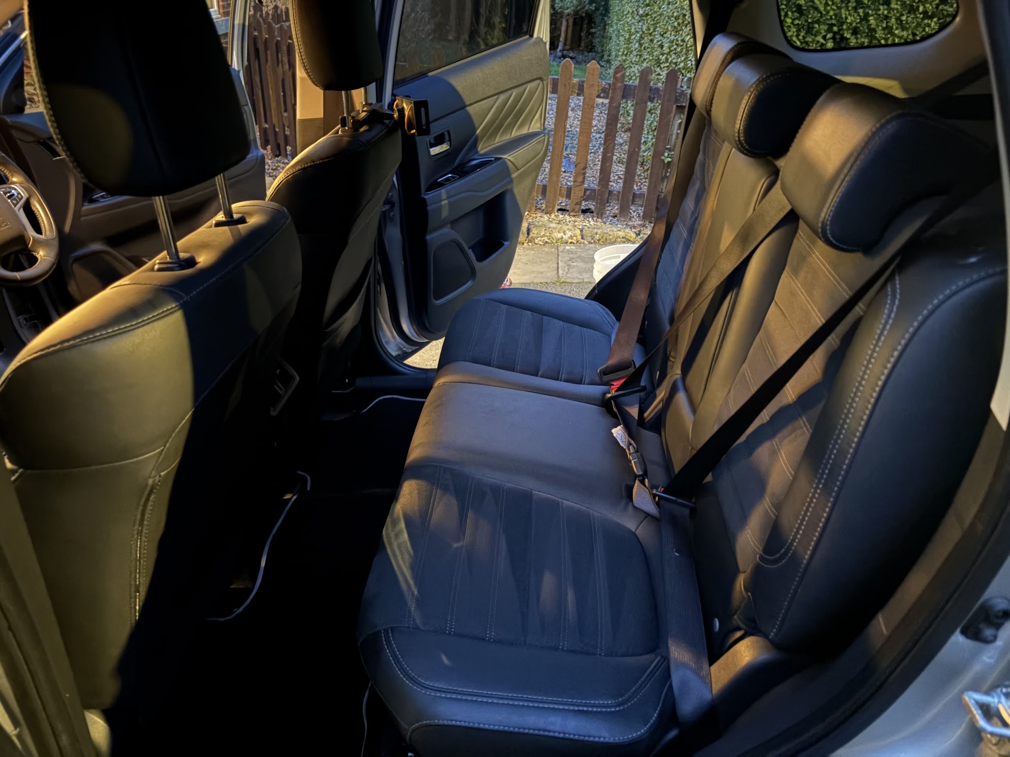 Van front seats and cabin in sunlight
